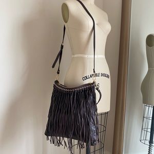 Brand new, never worn. Badgley Mischka fringe bag